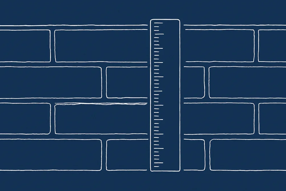 A plain ruler held against a recessed joint on a brick wall — when to repoint old brickwork, Ballarat. Illustrative example.